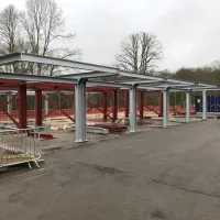An image showing some metal I beams we fabricated now being used to create a building